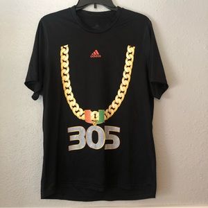 University of Miami turnover chain T shirt.